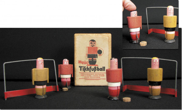 Tablefootball with figures of wood.